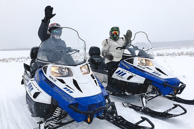Alaska Snowmobile Adventure Tour - Riding out from Alaska Wild Lights in North Pole