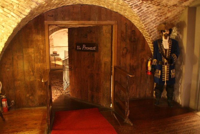 Charleston Ghost & Dungeon Night-Time Walking Tour with Entry to Provost Dungeon - Charleston’s French Quarter by lantern-lit streets