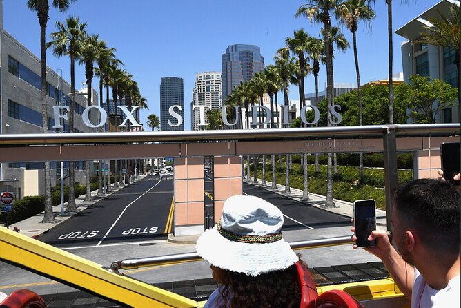 City Sightseeing Hop-On Hop-Off Bus Tour with Audio Guide - Downtown Purple Route: museums, old LA, and sports venues