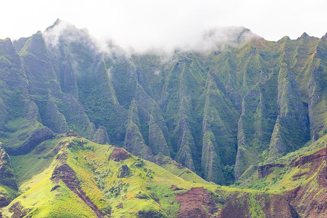 Deluxe Na Pali Morning Snorkel Tour on the Lucky Lady - Cruising past cliffs, waterfalls, and valleys