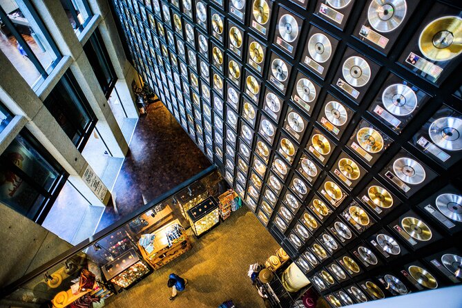 Discover Nashville City Tour with Entry to Ryman & Country Music Hall of Fame - Riding through Nashville by trolley or mini coach