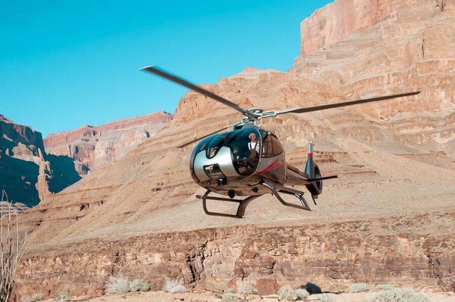 Grand Canyon West: West Rim Helicopter Tour with Landing - Leaving West Rim Airport and rising over the cliffs