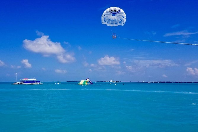 Key West Parasailing Adventure above Emerald Blue Waters - Stay dry, or ask for the ocean dip
