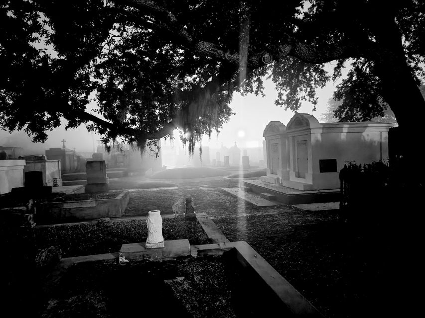 New Orleans: Cemetery Bus Tour At Dark with Exclusive Access - Riding through the French Quarter and Mid-City