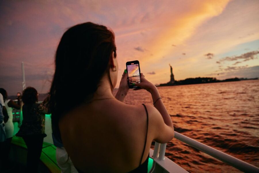 New York City: Gourmet Dinner Cruise with Live Music - Ellis Island and the Statue of Liberty at sunset