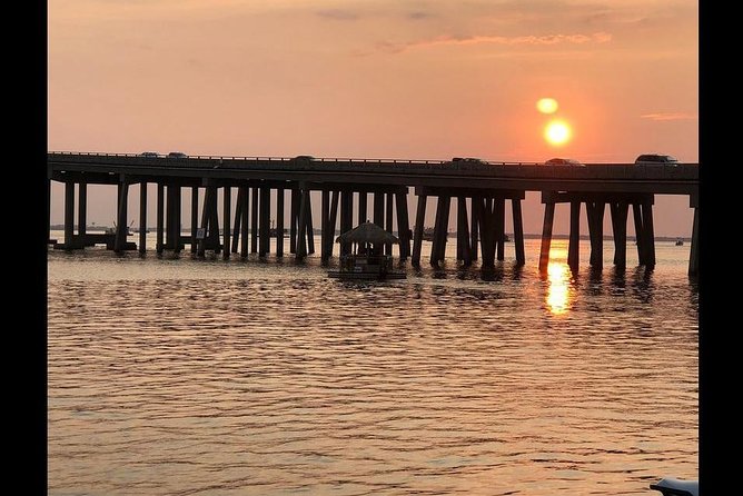 Original Cruisin' Tikis Sunset Cruise - Sunset views, dolphins, and the weather factor