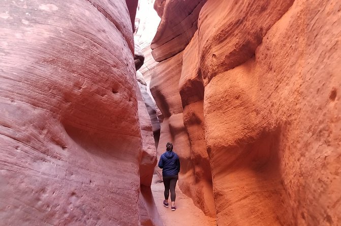 Peek-A-Boo Slot Canyon Tour UTV Adventure (Private) - Walking through the sculpted rock