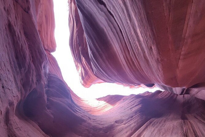 Peek-A-Boo Slot Canyon Tour UTV Adventure (Private) - Sandboarding turns the finish into play