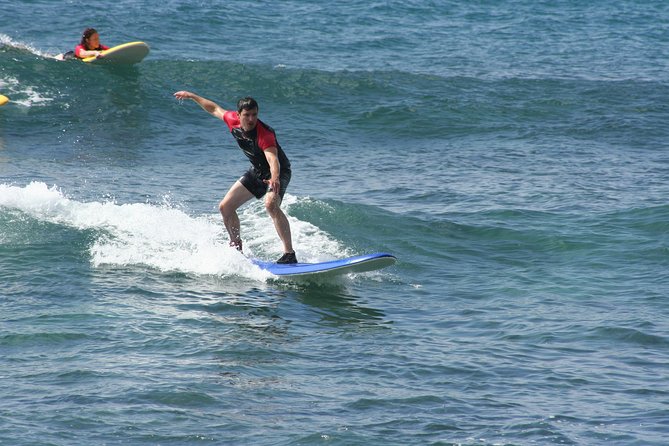 Po'ipu Surf Lesson - Starting on land with the pop-up and safety basics