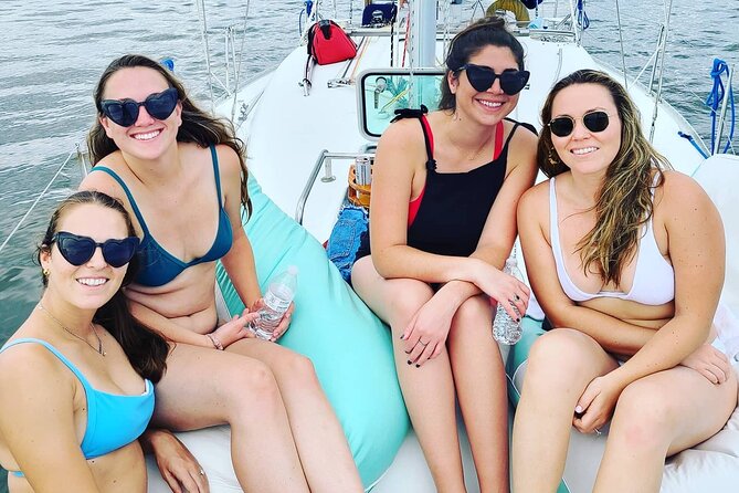 Private Luxury Yacht Charters, BYOB & Dolphins - Dolphins, sailboat races, and working harbor views