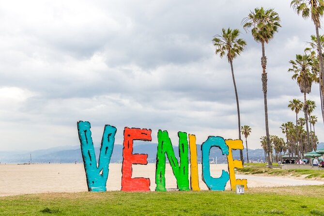 Shared 8-Hour Los Angeles City Sightseeing Tour from Long Beach - Leaving Long Beach and viewing the twin ports