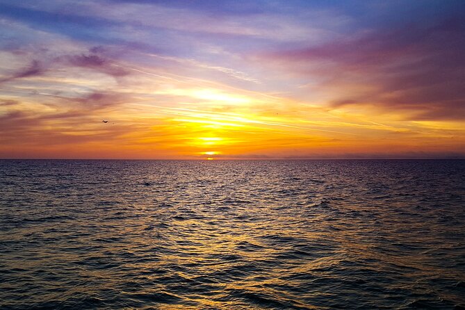 Sunset Celebration Cruise on Tropics Boat Tours - Dolphins are possible, but the sunset is the promise