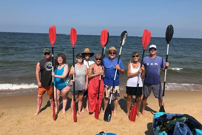 Sunset Dolphin Kayak Tours - Cape Henry Lighthouses from the water