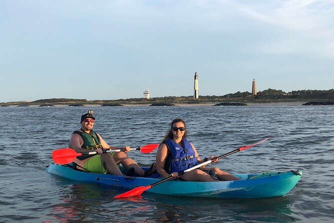 Sunset Dolphin Kayak Tours - Following the shoreline toward Cape Henry
